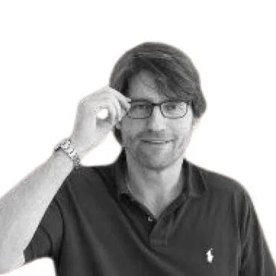 Black and white headshot of Ron
