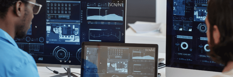 Kanerika blog banner showing Fabric data OneLake analytics dashboards on enterprise screens.