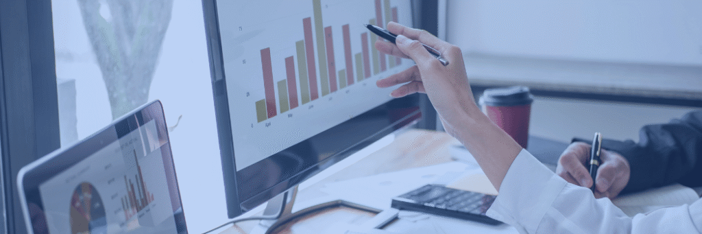 Kanerika blog banner for data center modernisation showing business analytics charts on a screen during data planning.