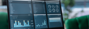 Kanerika blog banner showing analytics dashboards and reports built on Microsoft Fabric OneLake, enabling centralized data management, business intelligence, and data-driven decision-making.