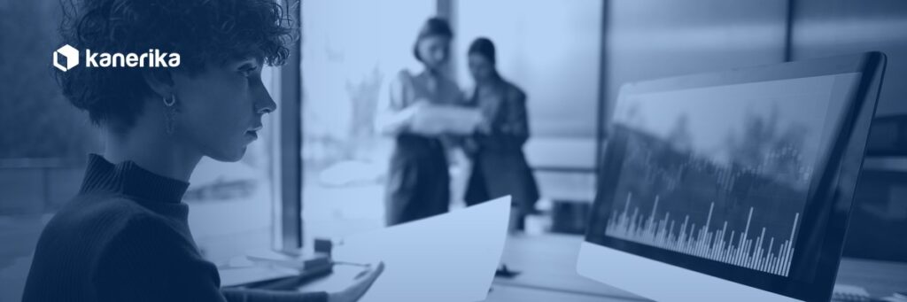 Analyst reviewing an Azure SQL Database cost dashboard, Kanerika Azure SQL Database pricing guide banner