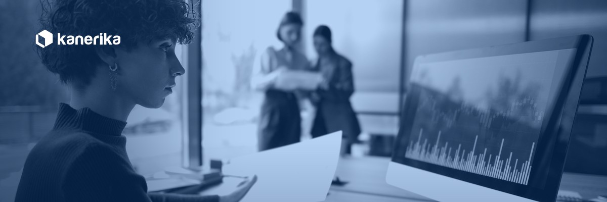 Analyst reviewing an Azure SQL Database cost dashboard, Kanerika Azure SQL Database pricing guide banner
