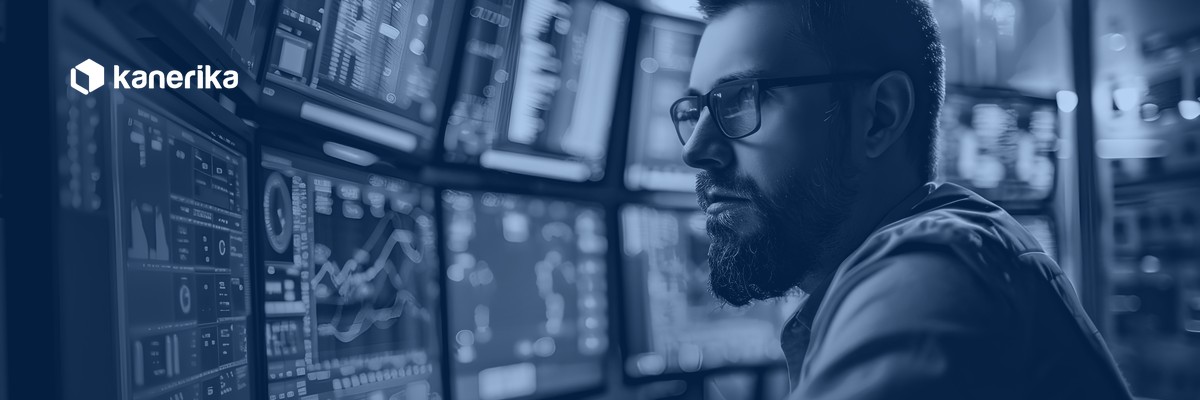 Data engineer monitoring pipeline dashboards across multiple screens, hero banner for Kanerika data engineering trends 2026 guide