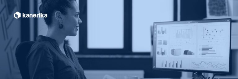 Kanerika data analyst hiring guide banner — analyst reviewing Power BI dashboards, hire data analyst