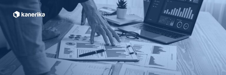 Hire a Tableau developer - analyst reviewing BI dashboard reports, Kanerika staff augmentation and BI consulting