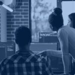 Diverse software engineering team collaborating at code screens, hero banner for Kanerika guide to the best IT staff augmentation companies in 2026