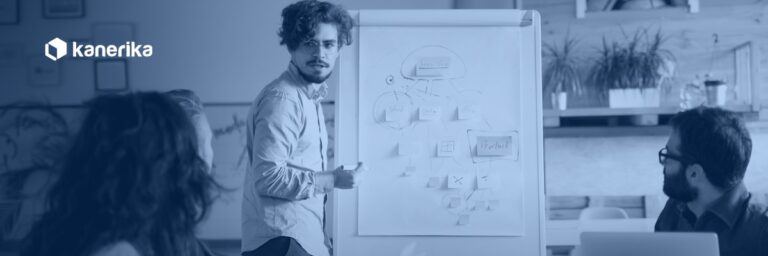 Team reviewing a proof of concept vs prototype vs MVP product roadmap on a whiteboard