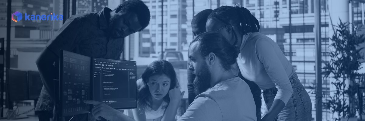 Software engineering team reviewing a software product launch checklist on screen, Kanerika