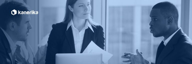 IT leaders weighing staff augmentation vs managed services in a boardroom partner discussion