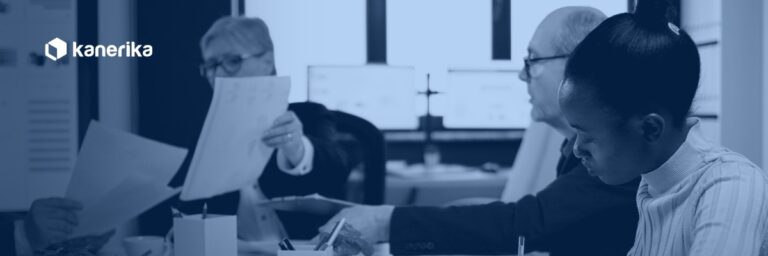 Engineering leaders reviewing engagement contracts while weighing staff augmentation vs outsourcing for their team