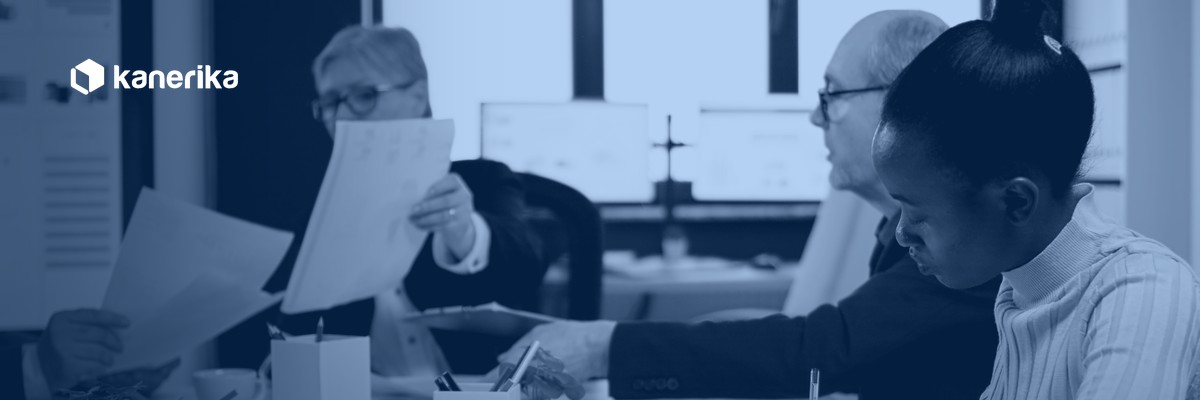 Engineering leaders reviewing engagement contracts while weighing staff augmentation vs outsourcing for their team