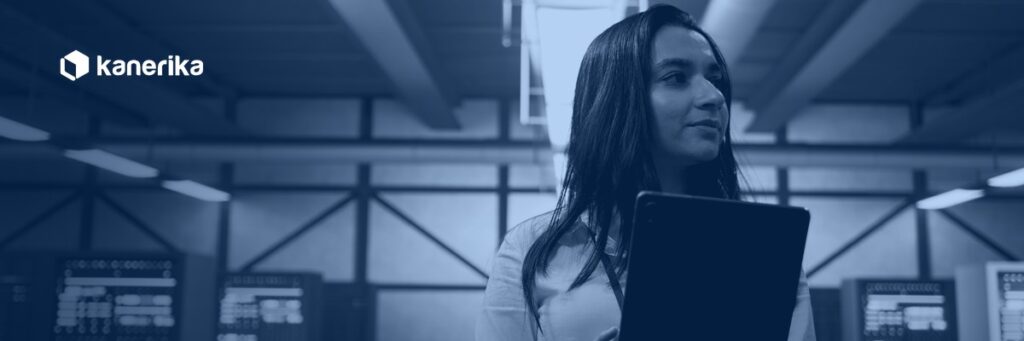 Kanerika banner for data access governance tools, a data center administrator reviewing security and access controls on a tablet
