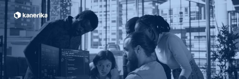 Kanerika banner showing a software engineering team collaborating around a monitor in an office, illustrating employee versus contractor staffing decisions