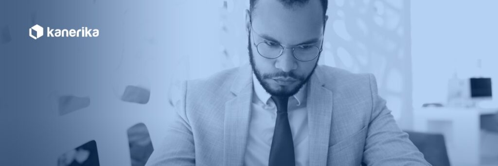 Businessman reviewing a contract document, representing AI contract policy compliance monitoring