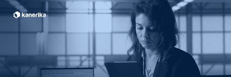 Professional reviewing AI tool data on a tablet, representing AI data leakage risk in the enterprise