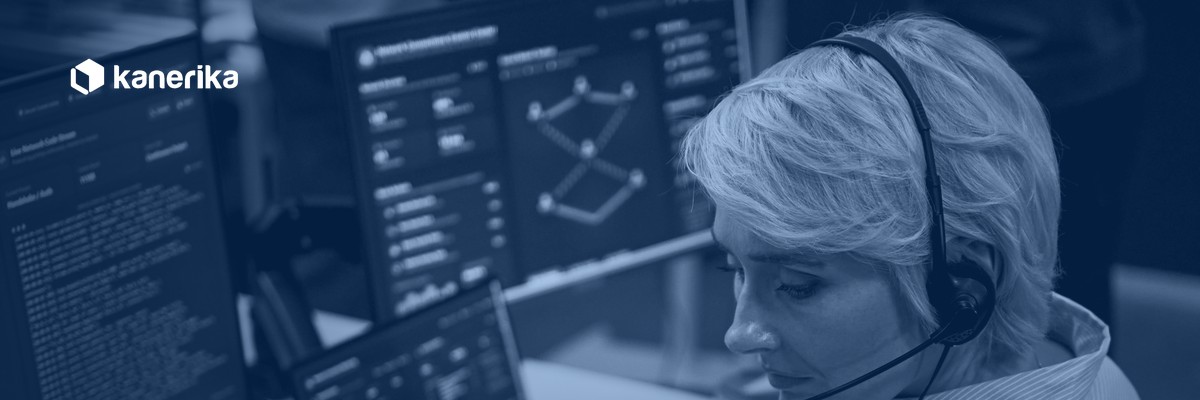 Kanerika data anonymization tools banner, security analyst reviewing data protection dashboards