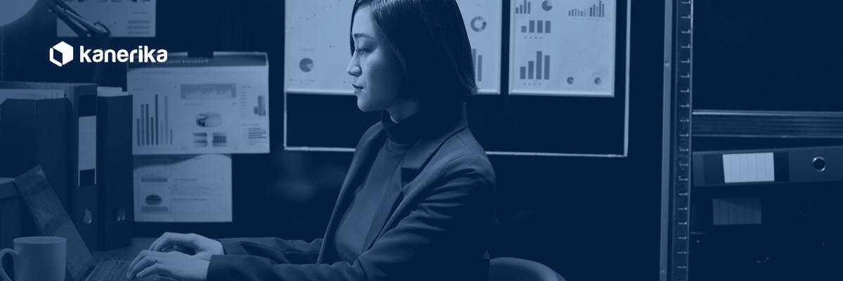 Analyst reviewing and classifying enterprise data records, representing data classification tools for enterprise security and compliance