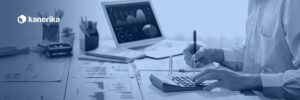 Analyst reviewing budget and BI dashboards while calculating Databricks cost optimization spend, Kanerika