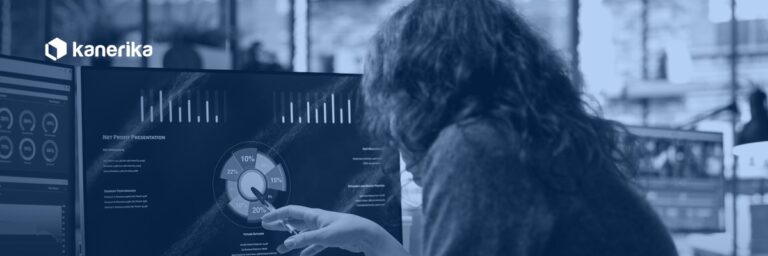 Data analyst reviewing a BI dashboard, hero banner for the Kanerika Databricks SQL warehouse guide