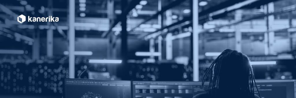 Data engineer reviewing Databricks system tables dashboards for cost, reliability, and governance monitoring in a data center