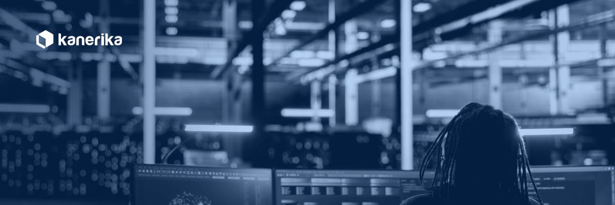 Data engineer reviewing Databricks system tables dashboards for cost, reliability, and governance monitoring in a data center