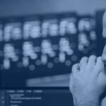 Engineer monitoring Snowflake data warehouse activity on dashboards for the Datadog Snowflake integration