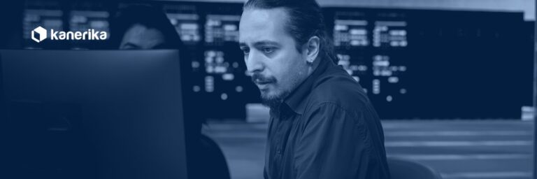 IT operations engineer reviewing generative AI incident alerts on monitoring dashboards in a data center