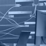 Kanerika banner for a guide to the best sensitive data discovery tools, showing a data security analyst reviewing live data flows on screen