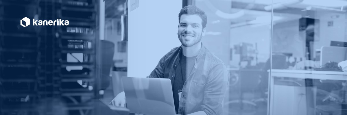 Data engineer working in a server room representing Kanerika Snowflake clone table guide