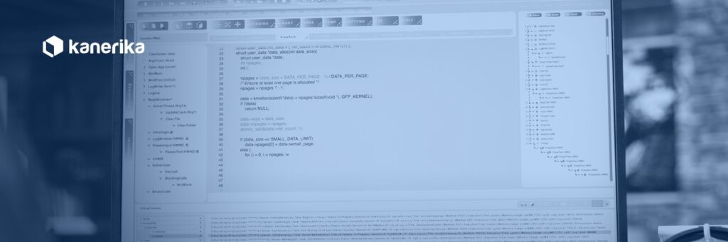 Kanerika banner for Snowflake CREATE TABLE guide, a coder writing SQL at a workstation with navy duotone treatment