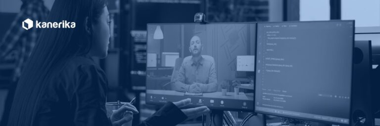Software developer on a video call with a remote colleague, representing communication and integration in staff augmentation engagements, Kanerika