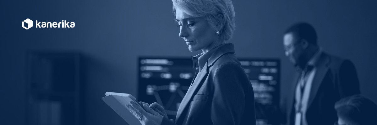 Compliance and security leader reviewing a unified AI governance architecture dashboard in a navy-toned office scene