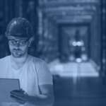 AI in demand forecasting banner showing a warehouse planner reviewing inventory data on a tablet