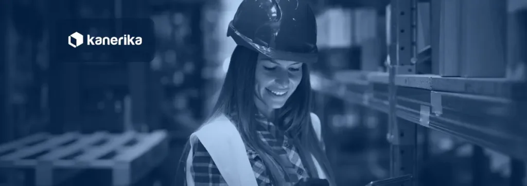 Warehouse worker with a tablet and barcode scanner checking inventory, illustrating AI in warehouse management