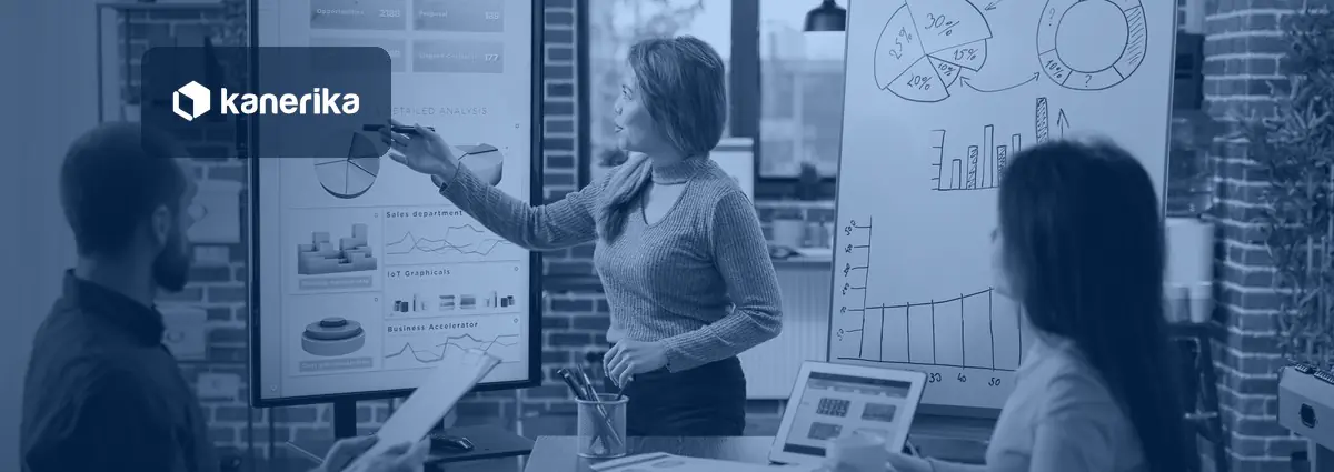 Marketing team reviewing AI marketing automation tools and campaign dashboards in a meeting room