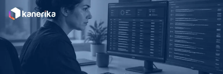 Security engineer running adversarial tests against an AI system on two monitors
