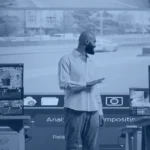Analysts reviewing live and recorded video feeds on monitors in an operations room, illustrating AI video analysis for enterprises