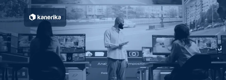 Analysts reviewing live and recorded video feeds on monitors in an operations room, illustrating AI video analysis for enterprises