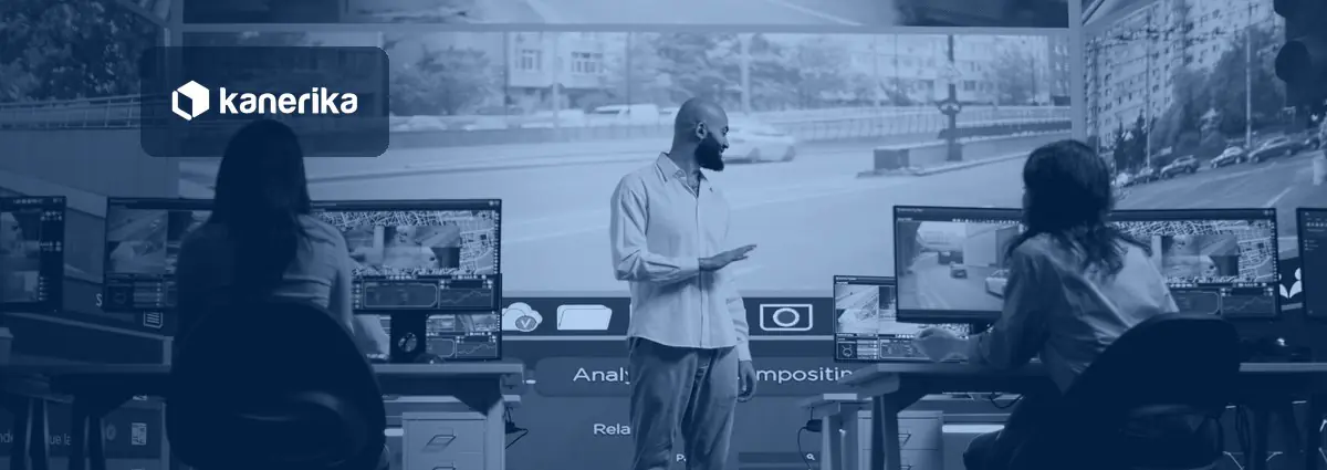 Analysts reviewing live and recorded video feeds on monitors in an operations room, illustrating AI video analysis for enterprises