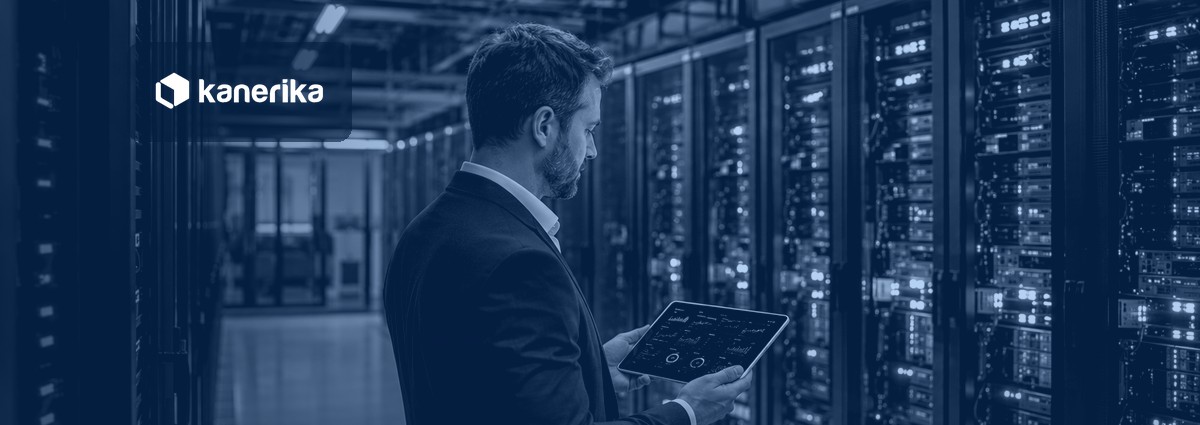 Kanerika banner for AI workload infrastructure: a data infrastructure architect reviewing GPU cluster utilization in a modern enterprise data center
