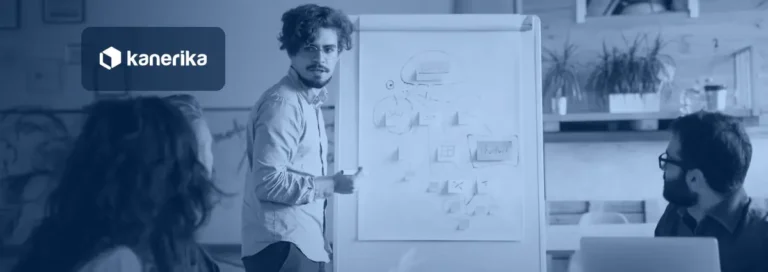 Product team planning a digital product roadmap at a whiteboard, representing digital product engineering