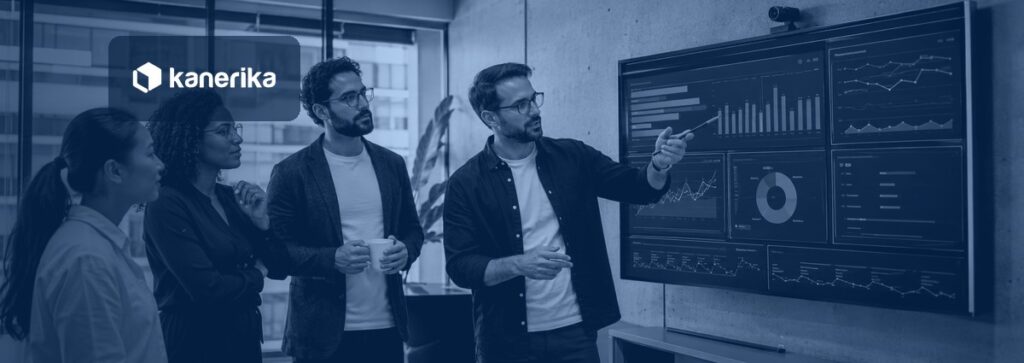 Engineering team reviewing a software delivery analytics dashboard showing engineering productivity metrics and deployment pipeline data