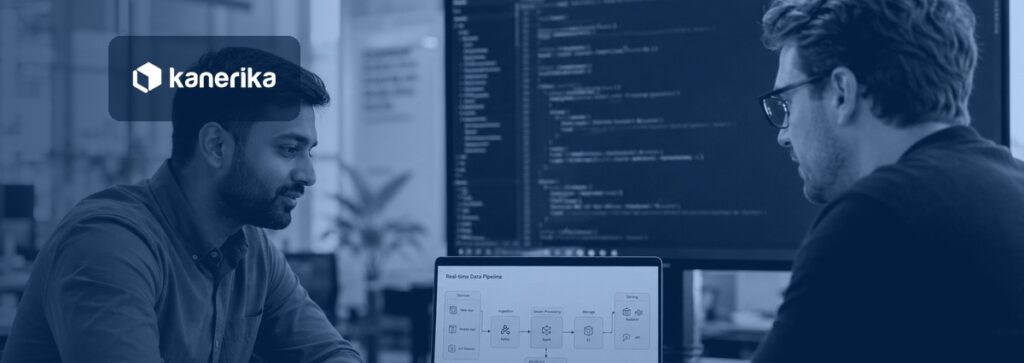 Hiring manager interviewing an ETL developer candidate in a modern data engineering office, Kanerika hire ETL developers guide