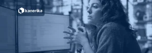 Software engineer reviewing code on a monitor, illustrating Jev AI use cases for enterprise decision automation