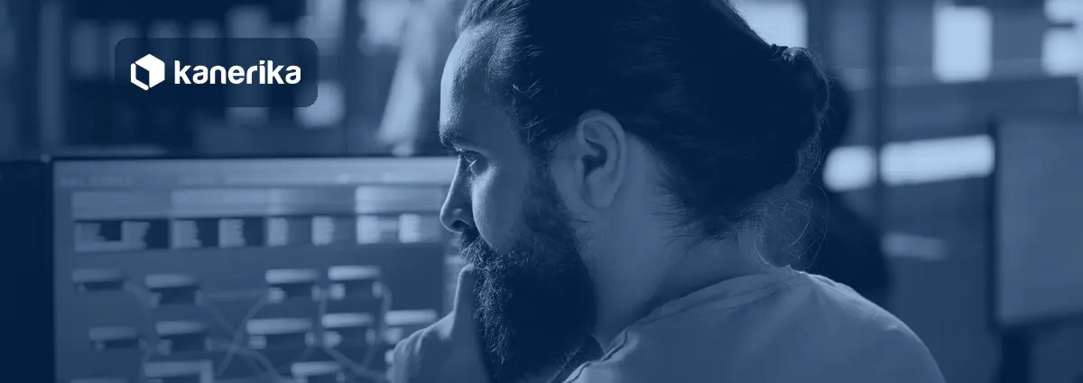 Engineer reviewing an AI decision workflow on screen, banner for Jev vs LLM comparison