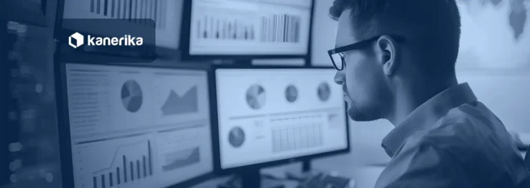 Data analyst reviewing Microsoft Fabric data analytics dashboards across multiple screens