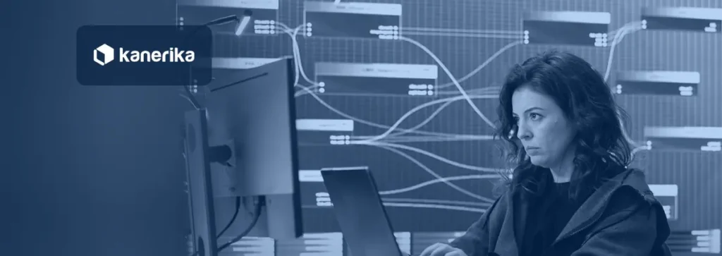 Security analyst monitoring data flows on a large display, illustrating Microsoft Purview Data Loss Prevention for enterprise data protection
