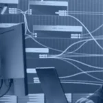 Security analyst monitoring data flows on a large display, illustrating Microsoft Purview Data Loss Prevention for enterprise data protection