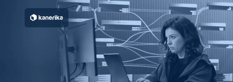 Security analyst monitoring data flows on a large display, illustrating Microsoft Purview Data Loss Prevention for enterprise data protection
