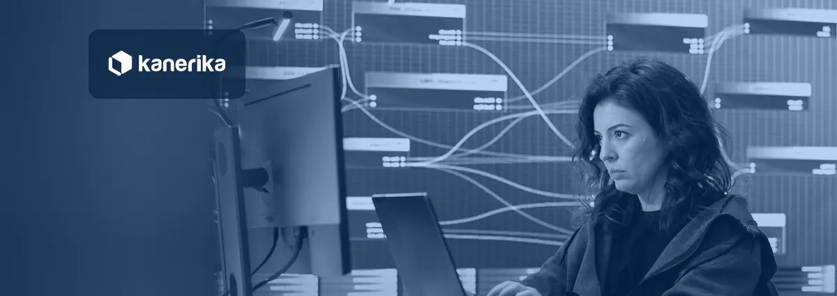 Security analyst monitoring data flows on a large display, illustrating Microsoft Purview Data Loss Prevention for enterprise data protection